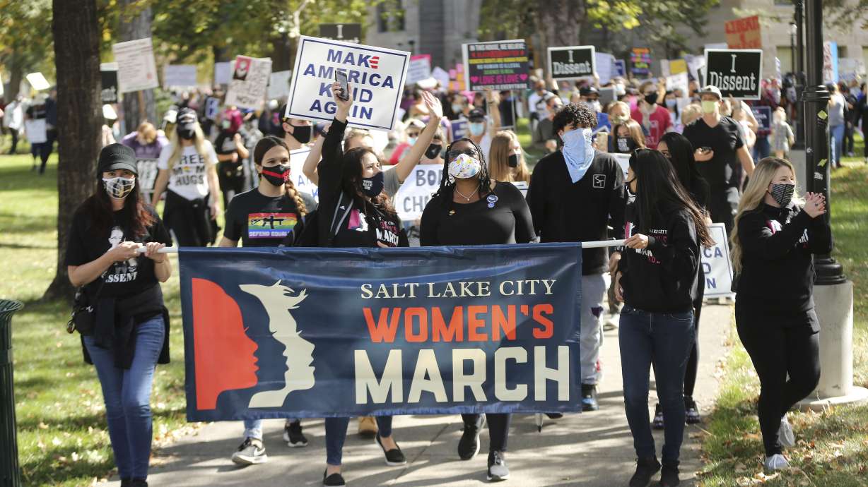 Women's march participants leave the Salt Lake City-County Building for the state Capitol in Salt Lake City on Saturday, Oct. 17, 2020. The march was tied with the Washington D.C. march in opposition to President Donald Trump.