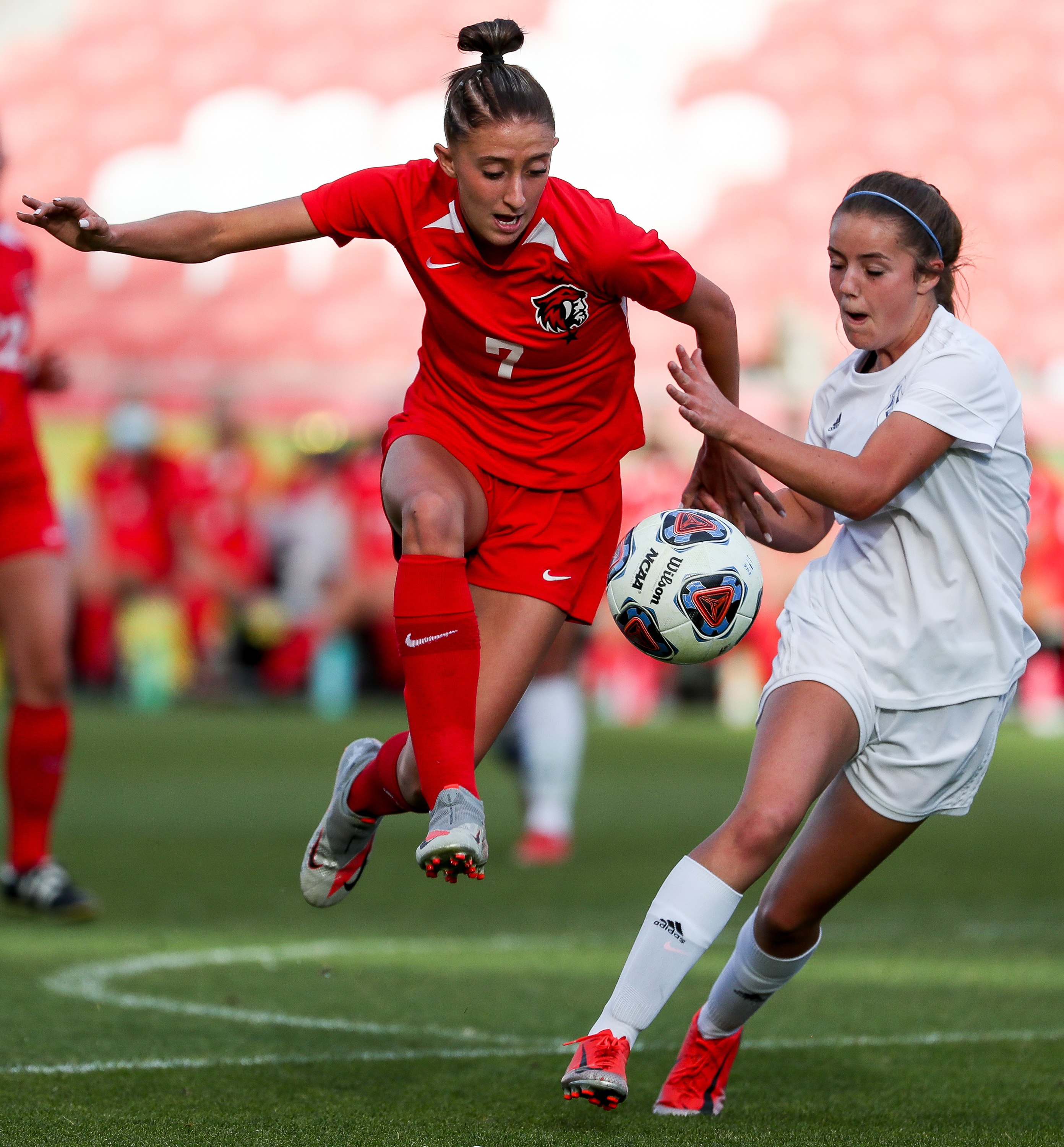 American Fork’s Addie Gardner moves the ball past Fremont’s Jamie Elliott in a 6A girls soccer semifinal game at Rio Tinto Stadium in Sandy on Tuesday, Oct. 20, 2020.