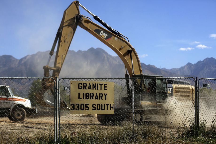 Construction crews work on the site of the future Granite Library in South Salt Lake on Tuesday, Oct. 20, 2020. New libraries are also under construction in Kearns and Daybreak and are included in the proposed 2021 Salt Lake County budget.
