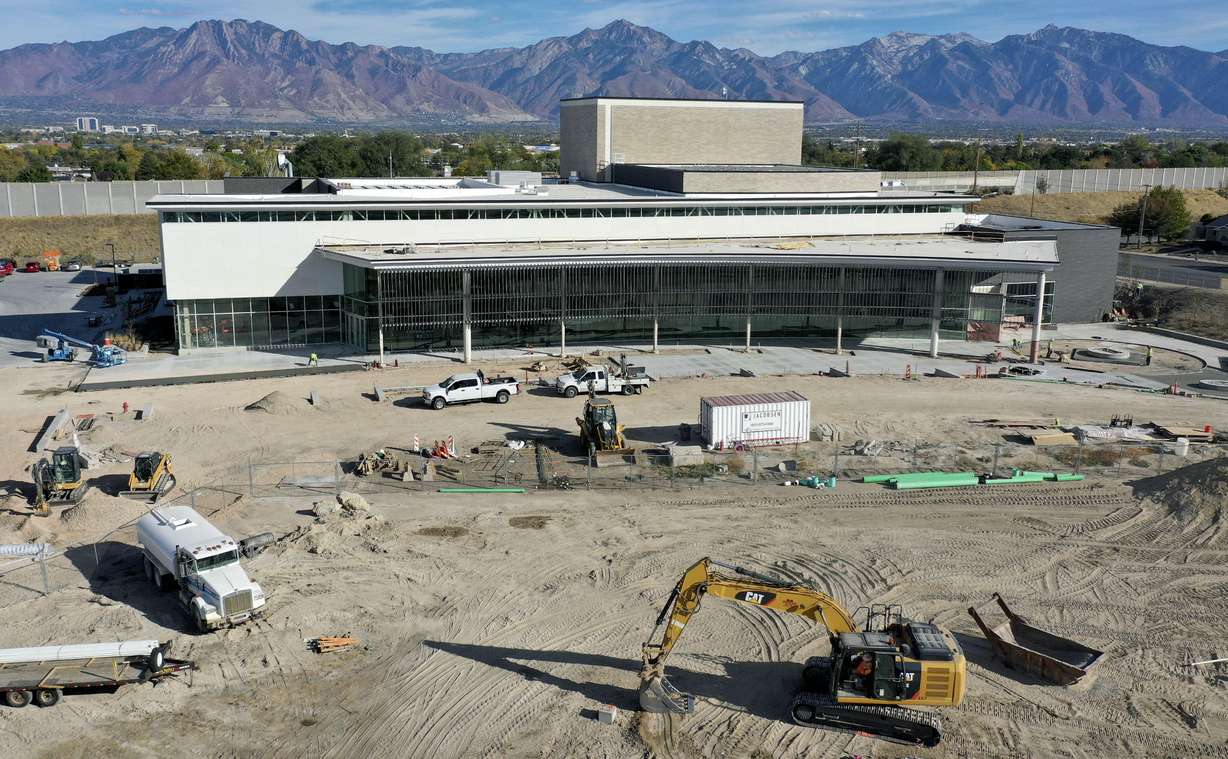 Construction crews work on the Mid-Valley Performing Arts Center in Taylorsville on Tuesday, Oct. 20, 2020.