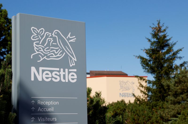 FILE PHOTO: A logo is pictured on the Nestle research center before the presentation of Sensationnal Vuna, a plant-based tuna product made by Garden Gourmet, at Vers-chez-les-Blanc in Lausanne, Switzerland August 20, 2020. REUTERS/Denis Balibouse
