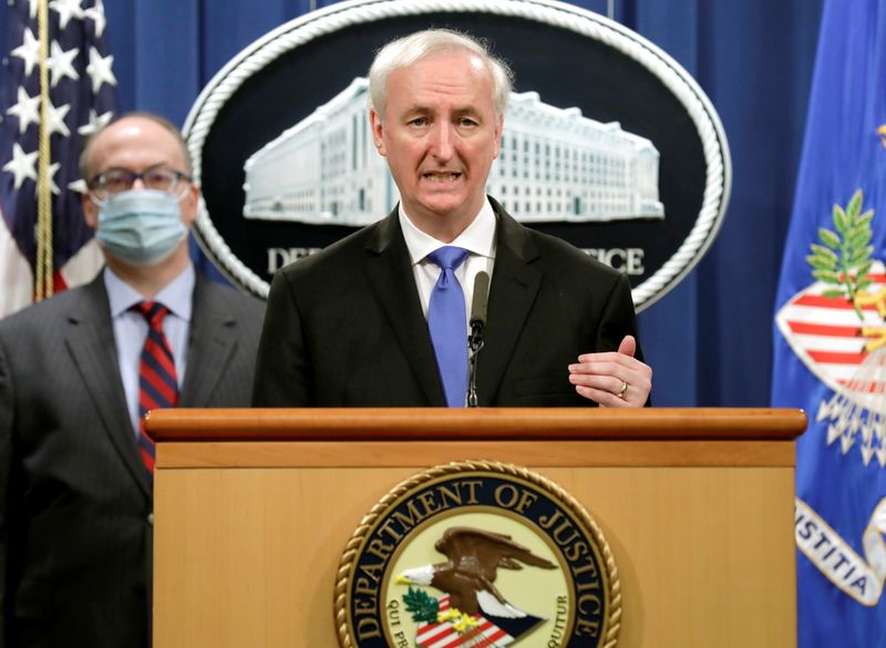 Deputy U.S. Attorney General Jeffrey Rosen holds a news conference to announce the results of the global resolution of criminal and civil investigations with an opioid manufacturer at the Justice Department in Washington, U.S., October 21, 2020. REUTERS/Yuri Gripas/Pool