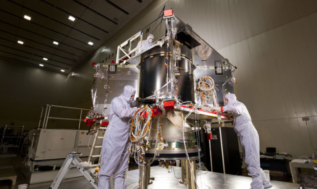 Technicians begin assembling the OSIRIS-REx spacecraft in a Lockheed Martin Space clean room facility near Denver, Colorado. Date Taken: Mar. 26, 2015 Credit: Lockheed Martin