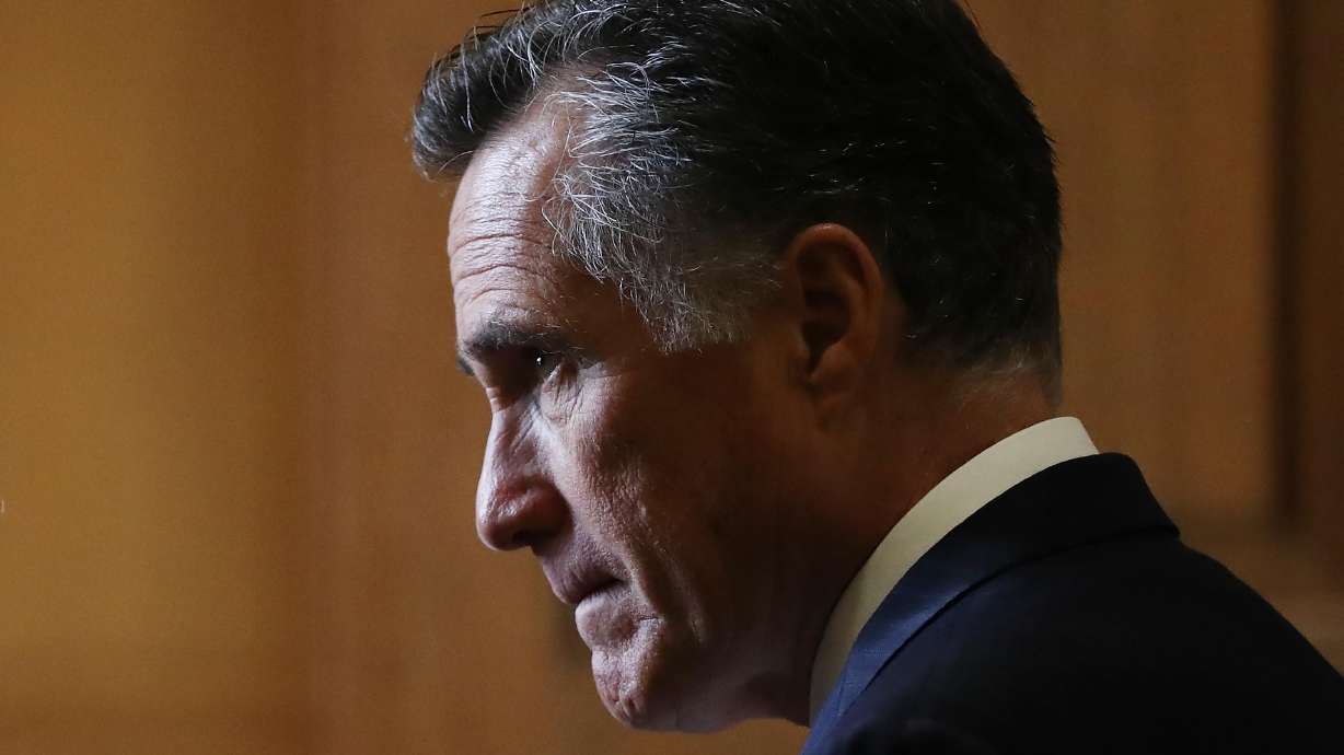 WASHINGTON, DC - JANUARY 24: Sen. Mitt Romney (R-UT) stands in a hallway near the Senate chamber in the U.S. Capitol on January 24, 2020 in Washington, DC. Impeachment trial proceedings against President Donald Trump have resumed today. (Photo by Mario Tama/Getty Images)