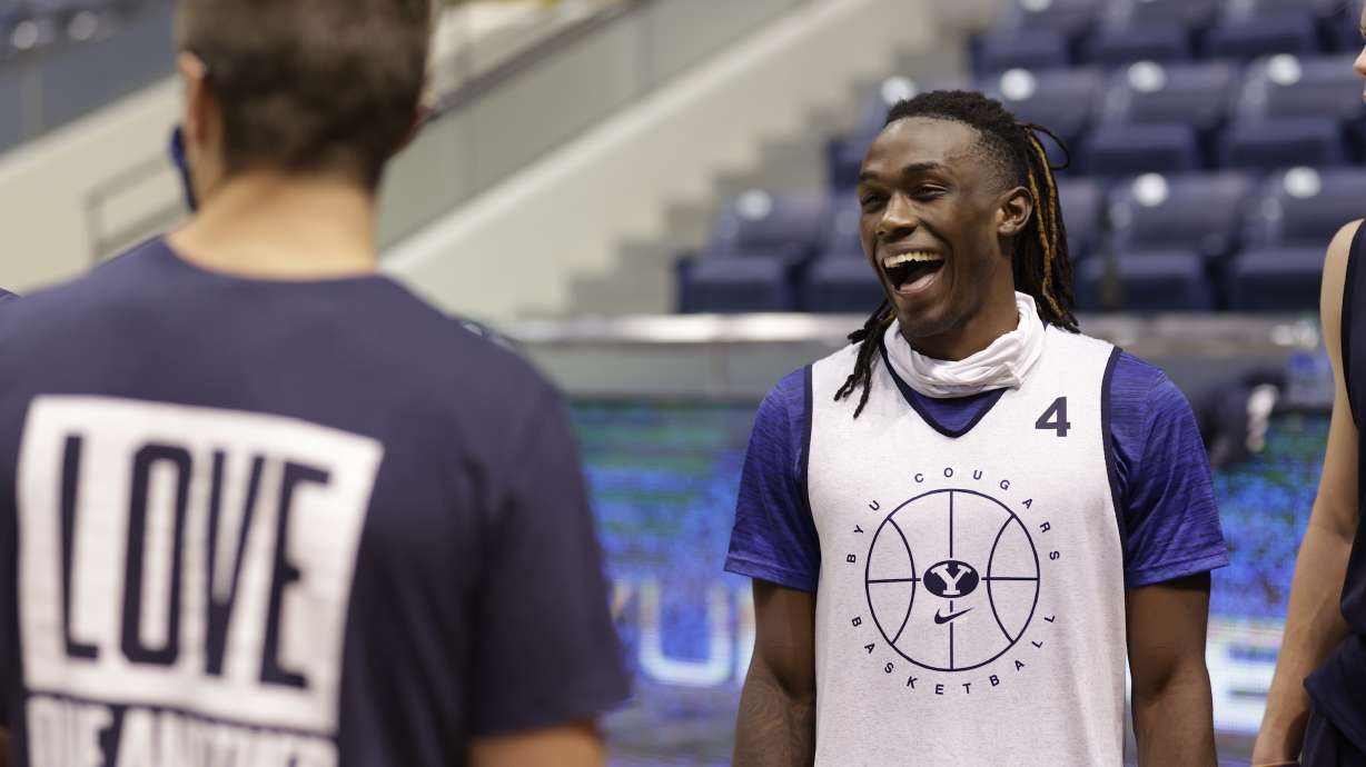 BYU guard Brandon Averette (4) laughs during practice in the Marriott Center.