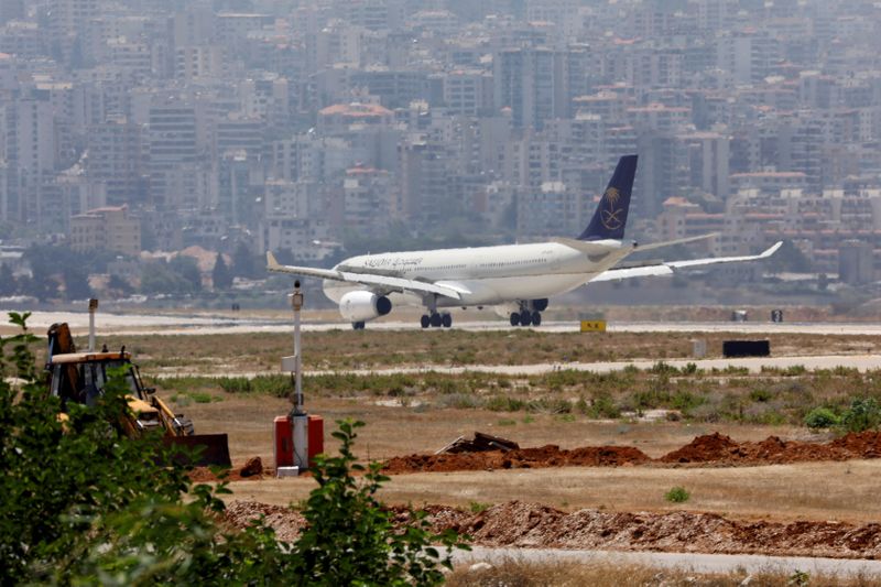 FILE PHOTO: A Saudia, also known as Saudi Arabian Airlines, plane lands at Rafik al-Hariri airport in Beirut, Lebanon June 29, 2017. REUTERS/Jamal Saidi