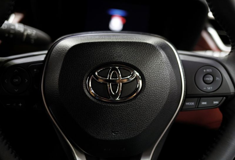 FILE PHOTO: The Toyota emblem is seen on the tyre rim of a vehicle during the media day of the 41st Bangkok International Motor Show after the Thai government eased measures to prevent the spread of the coronavirus disease (COVID-19) in Bangkok, Thailand July 14, 2020. REUTERS/Jorge Silva