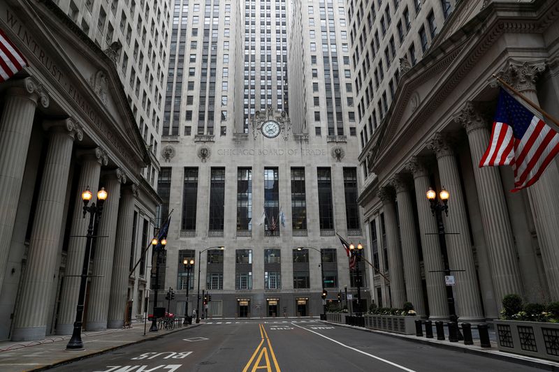 FILE PHOTO: Empty streets are seen in front of the closed Chicago Board of Trade, as the spread of the coronavirus disease (COVID-19) continues, in Chicago, Illinois, U.S., April 23, 2020.  REUTERS/Shannon Stapleton