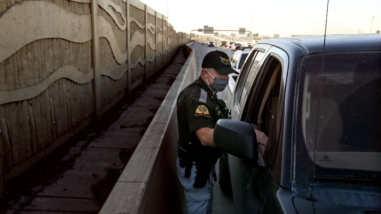 Utah Highway Patrol Cpl. Mike Alexander speaks to a driver about his use of a cellphone while driving in Utah County on Wednesday, Oct. 29, 2020. Seven Utah County law enforcement agencies participated in a distracted driving crackdown on Thursday.