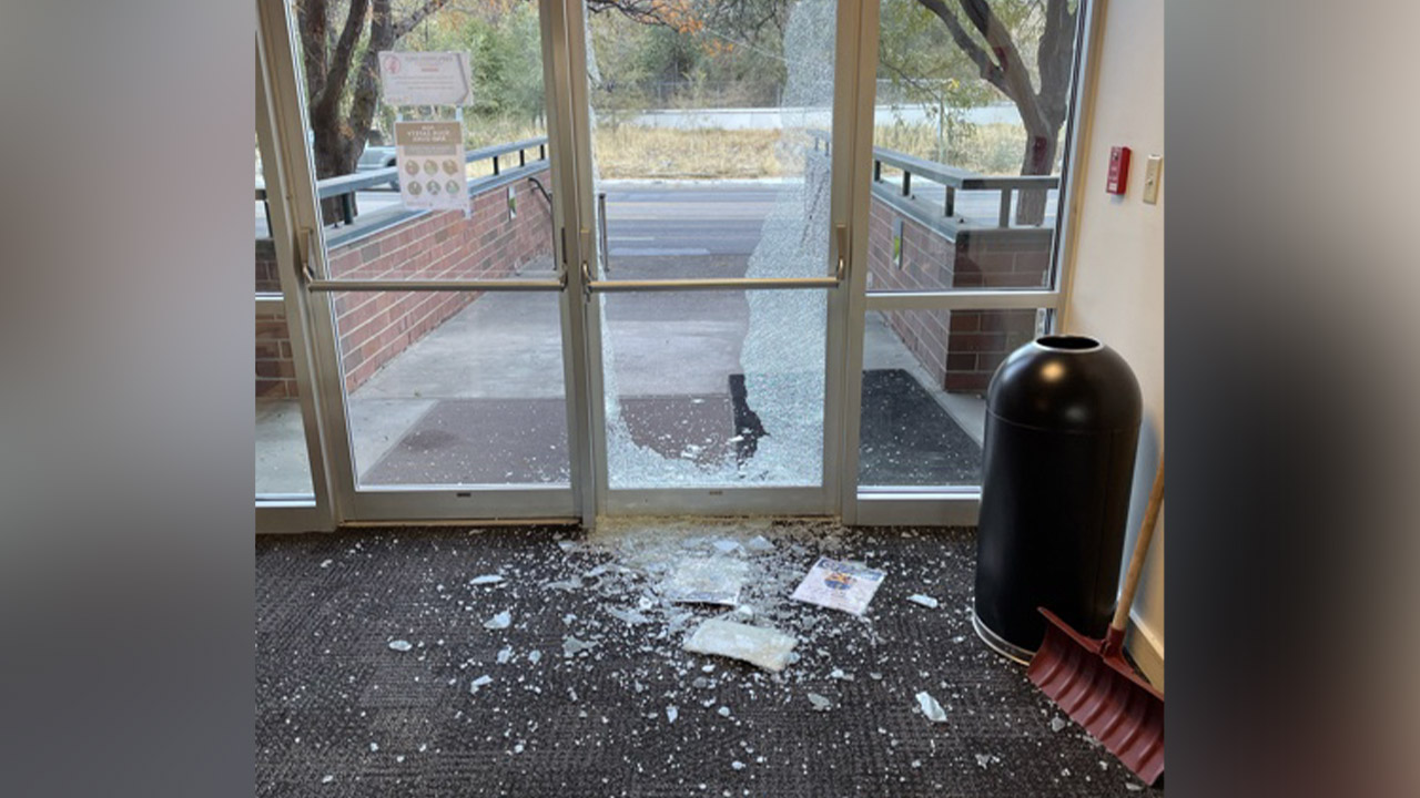Utah Department of Health building in Millcreek has glass door shot out