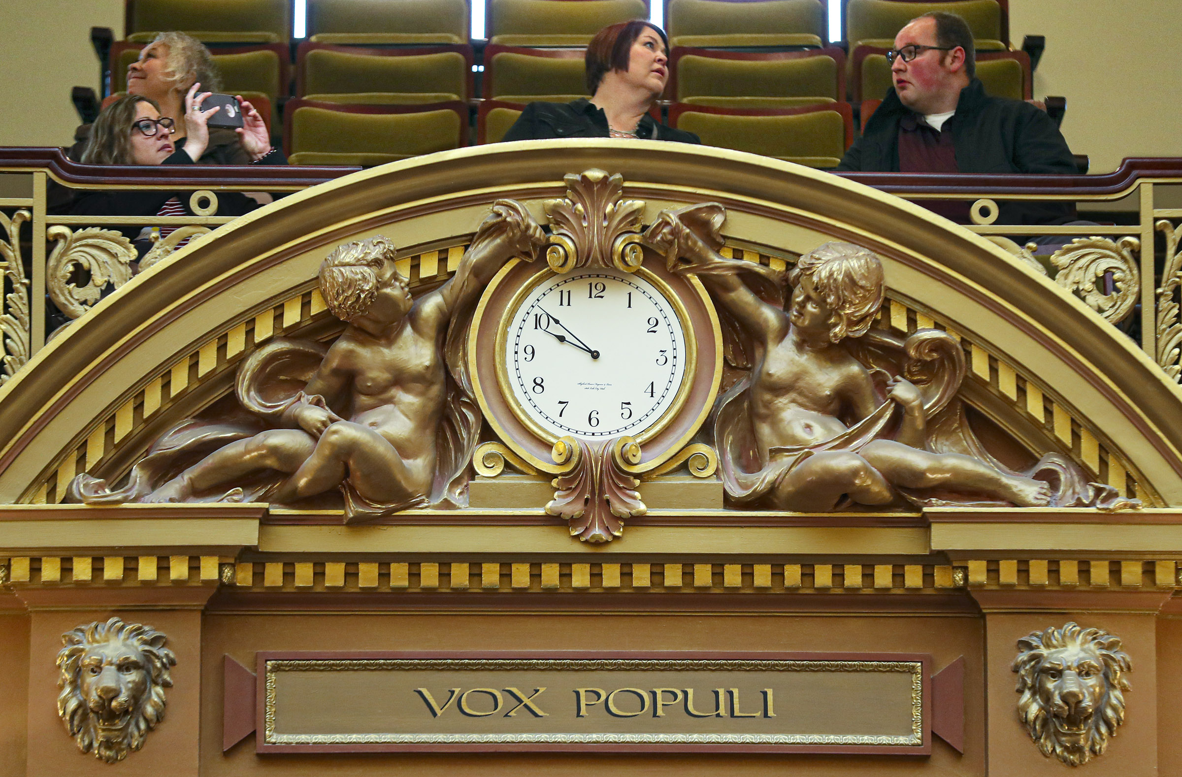 People begin to fill the gallery above the clock in the House of Representatives during a break at the Capitol in Salt Lake City on Thursday, Jan. 30, 2020.