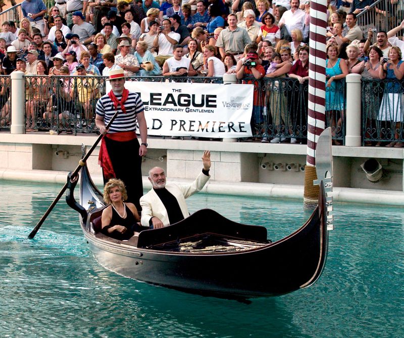 FILE PHOTO: Actor Sean Connery and his wife Micheline arrive by gondola at the Venetian Resort Hotel & Casino in Las Vegas, Nevada, June 30, 2003 for the premiere of the film "The League of Extraordinary Gentlemen". REUTERS/Ethan Miller/Las Vegas Sun