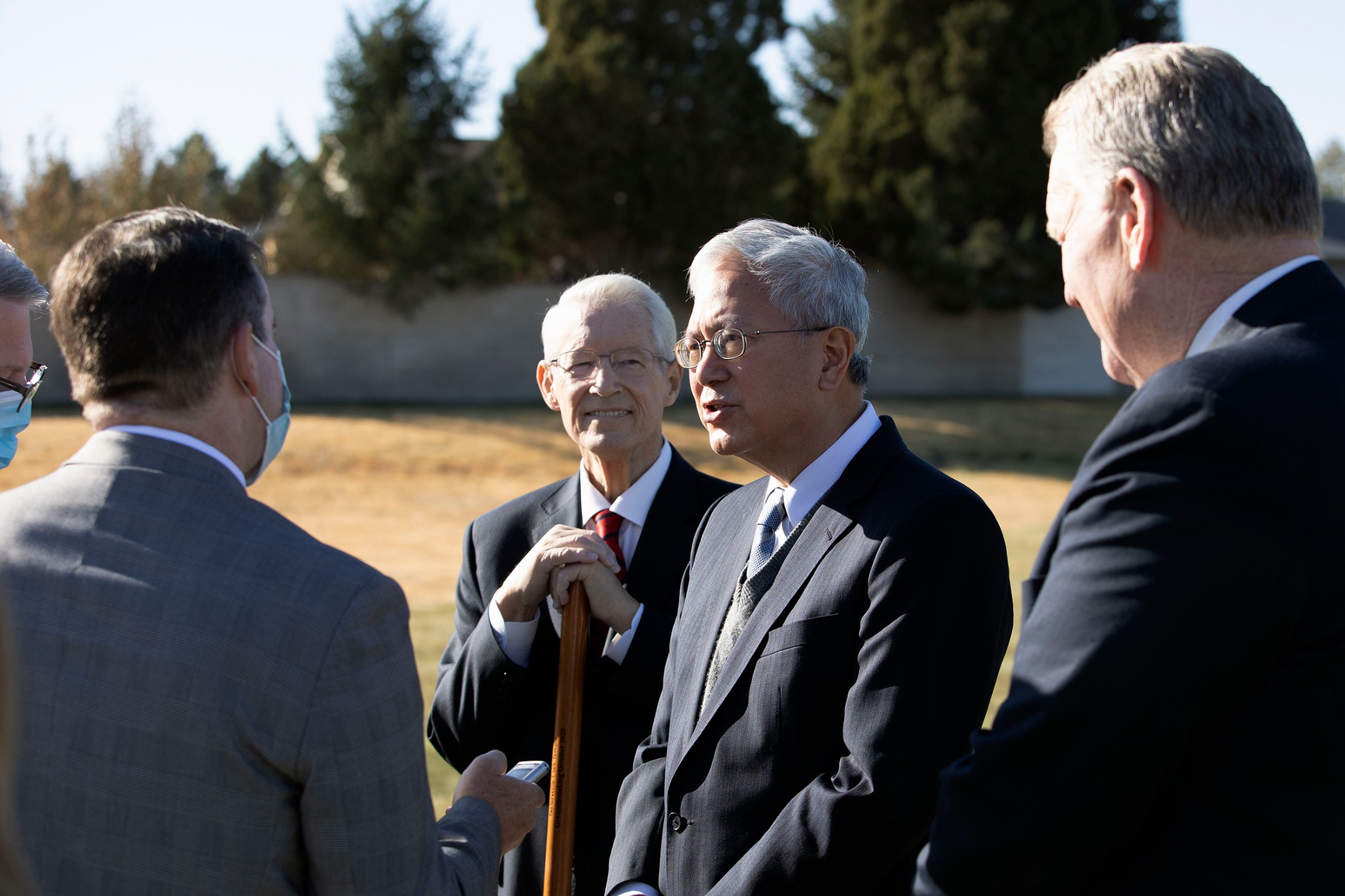 Elder Gerrit W. Gong of the Quorum of the Twelve Apostles and other Church leaders visit with the news media following the groundbreaking of the Taylorsville Utah Temple on Saturday, October 31, 2020.
