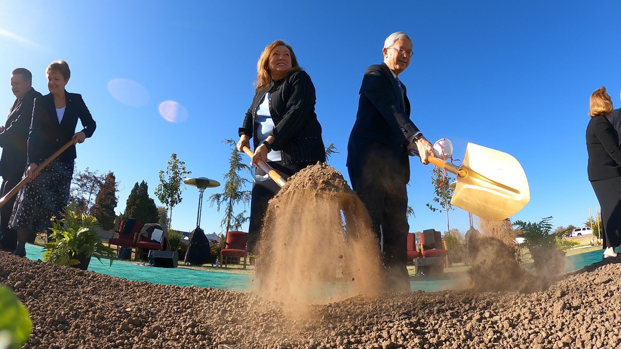 Elder Gerrit W. Gong of the Quorum of the Twelve Apostles and his wife, Susan, participate in the groundbreaking of the Taylorsville Utah Temple on Saturday, October 31, 2020.
