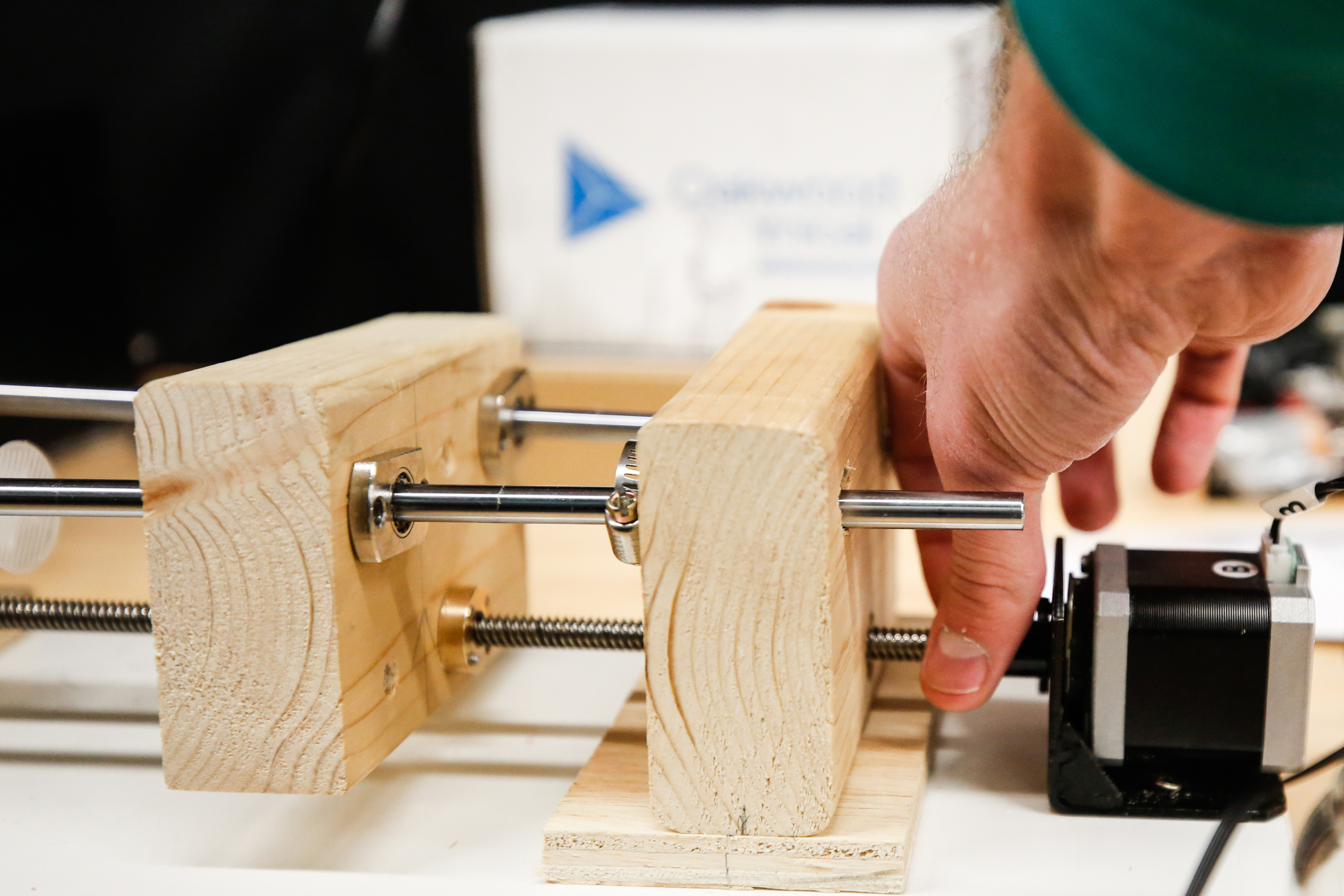 Spencer Curtis adjusts a prototype of an electrical spinning machine in the engineering resource lab at BYU in Provo on Monday, Oct. 26, 2020. The machine can be used to spin a nanofiber membrane that can be sandwiched between the cloth pieces of a homemade mask, increasing effectiveness while preserving breathability.