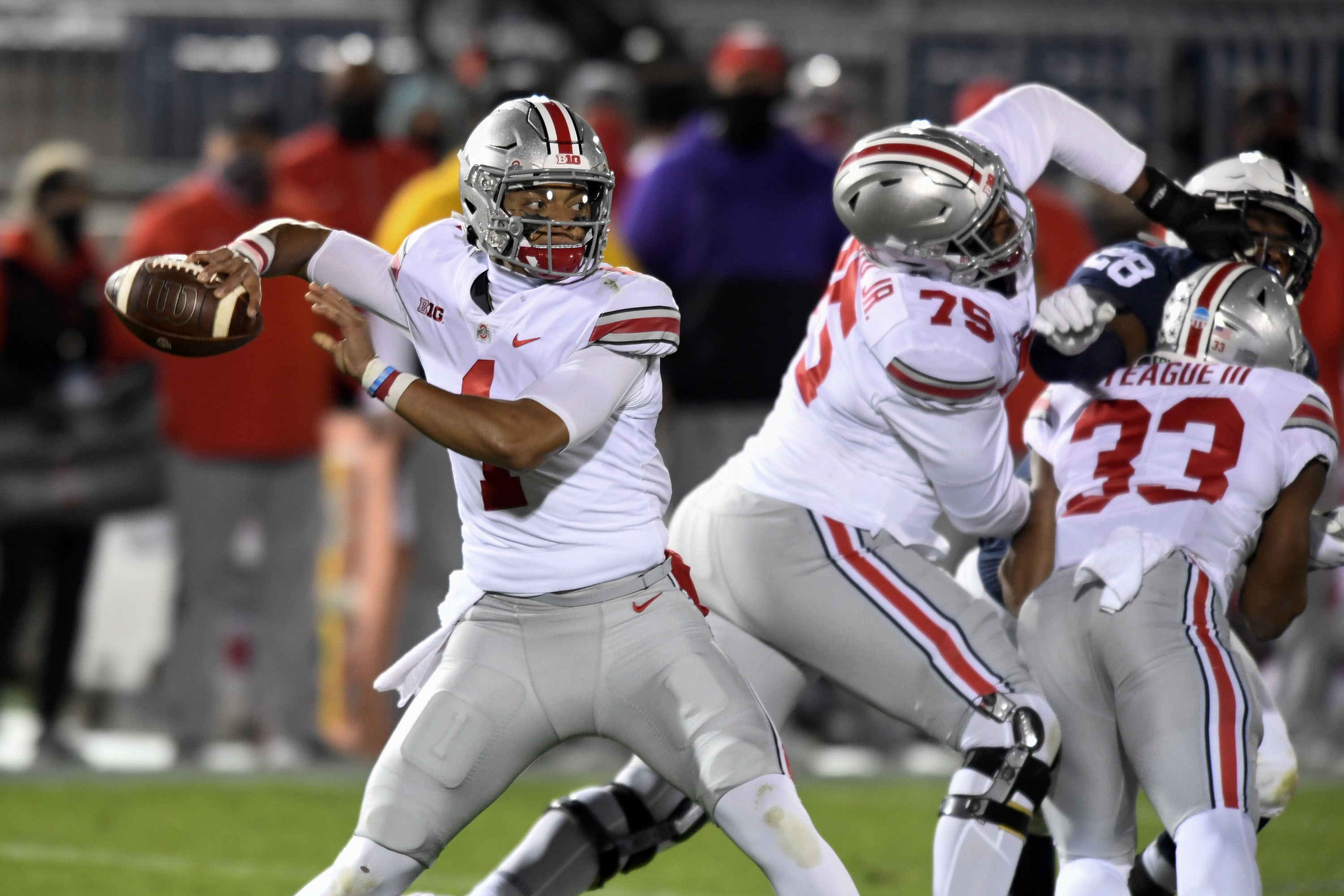 In empty white out, No. 3 Ohio State beats Penn State  38-25