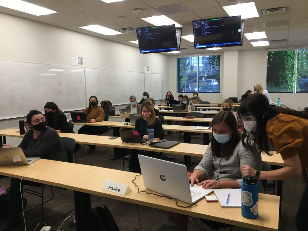 Women take part in the recently-launched TECH-MOMS program on Oct. 10, 2020, in Lehi, Utah, The 9-week intensive coding and mentorship program to help women break into the industry at a time when they need it most. (Jon Reed/KUER-FM via AP)