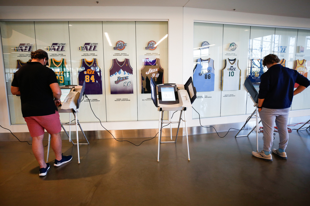 Voters complete the ballot on the voting machines during the Election Day voting at Vivint SmartHome Arena in Salt Lake City on Tuesday, Nov. 3, 2020.