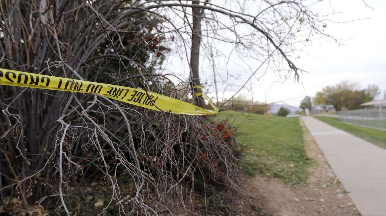 Police tape hangs at Tanner Park in Salt Lake City on Oct. 19, 2020, where a 25-year-old man was shot and killed. A man pleaded guilty to the killing in May as part of a plea deal that significantly reduced charges against him.