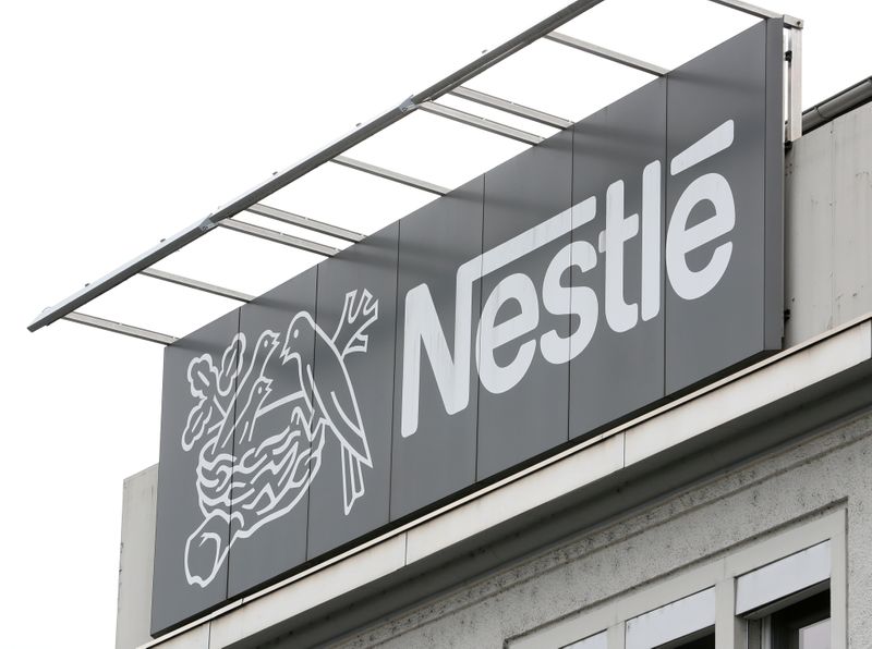 FILE PHOTO: The company's logo is seen at a Nestle 1lant in Konolfingen, Switzerland September 28, 2020. REUTERS/Arnd Wiegmann