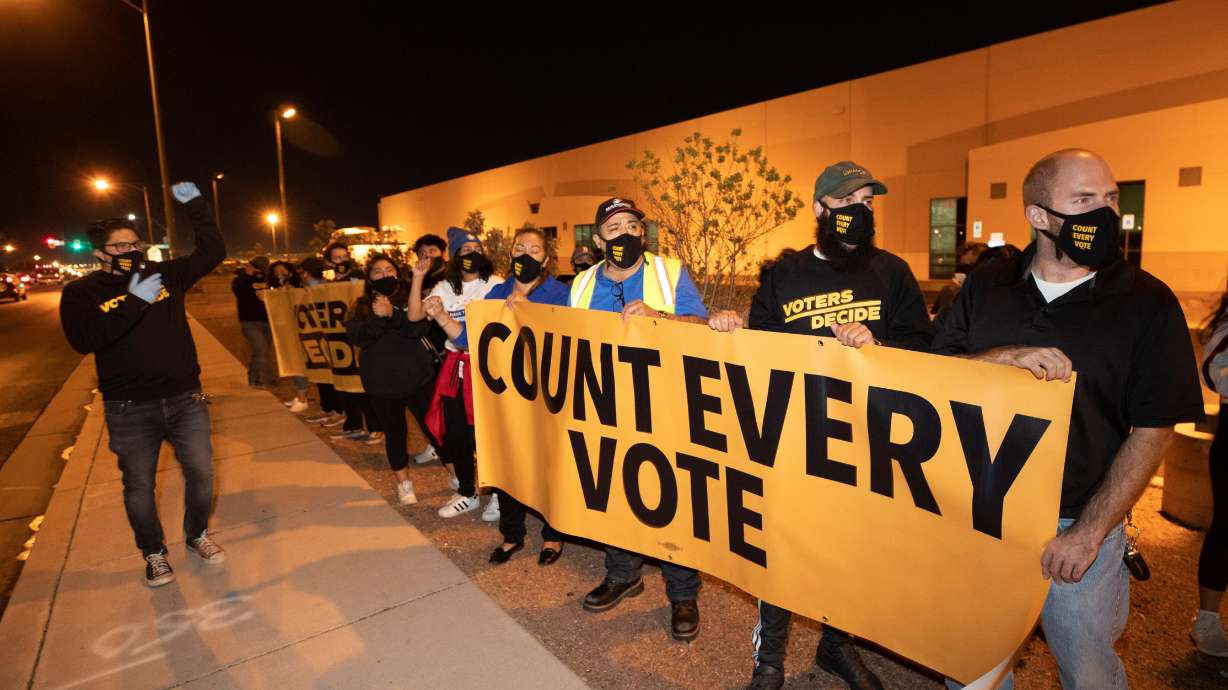 Counter-protesters, organized by Make the Road Action Nevada and PLAN Action, chant during a "Stop the Steal" protest by supporters of U.S. President Donald Trump at the Clark County Election Center in North Las Vegas, Nevada, U.S. November 4, 2020. REUTERS/Steve Marcus