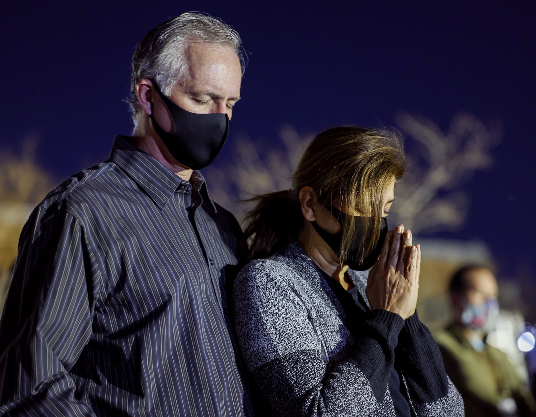 Joel Wells and Mondie Mahdavi join with parents, faculty and students as they gather at the Skaggs Catholic Center Grotto of Our Lady of Guadalupe at Juan Diego Catholic High School in Draper to recite the rosary on Wednesday, Nov. 4, 2020.