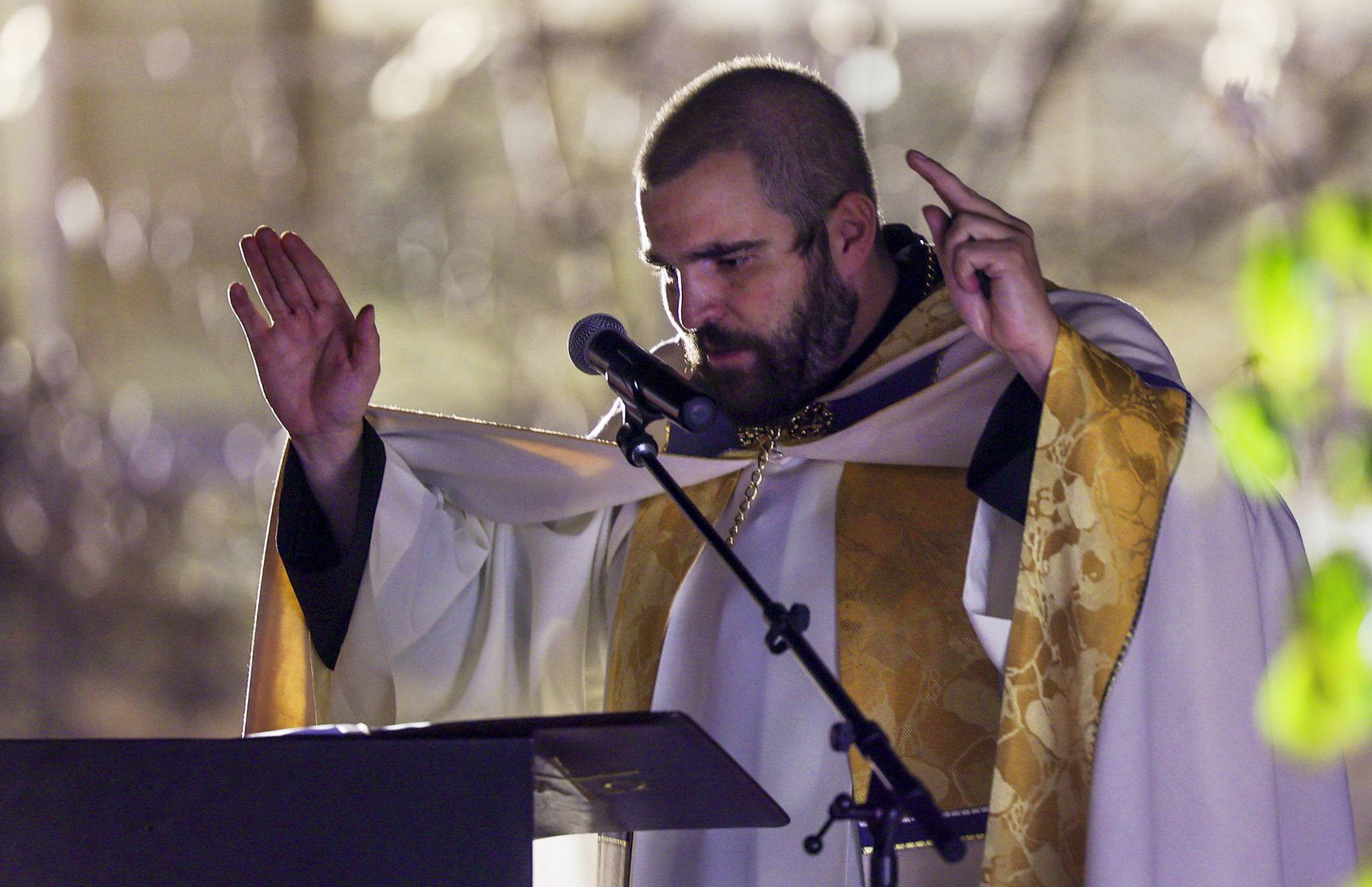 The Rev. Stephen Tilley, pastor at St. John the Baptist Catholic Church leads the group in prayer as parents, faculty and students gather at the Skaggs Catholic Center Grotto of Our Lady of Guadalupe at Juan Diego Catholic High School in Draper to recite the rosary on Wednesday, Nov. 4, 2020.