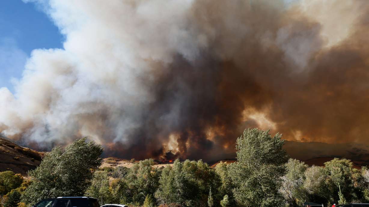 Smoke from a brush fire that broke out at the base of Mount Timpanogos in Orem is pictured on Saturday, Oct. 17, 2020.