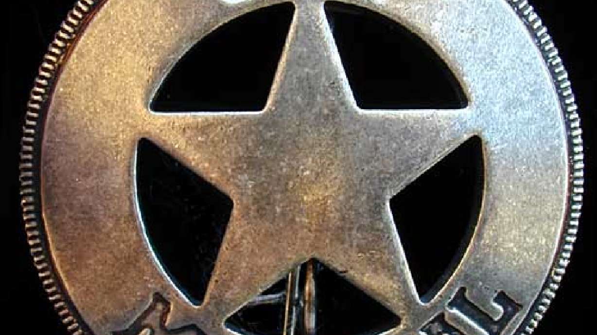 Man Charged with Bank Fraud, Impersonating Federal Marshal