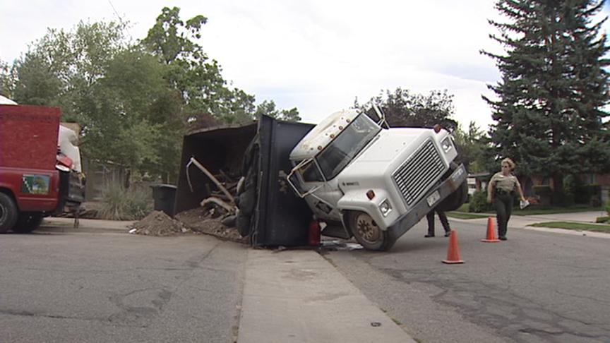 Blown Tire Makes Dumptruck Roll