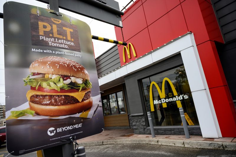 FILE PHOTO: A sign promoting McDonald's "PLT" burger with a Beyond Meat plant-based patty at one of 28 test restaurant locations in Ontario, Canada October 2, 2019. REUTERS/Moe Doiron/File Photo