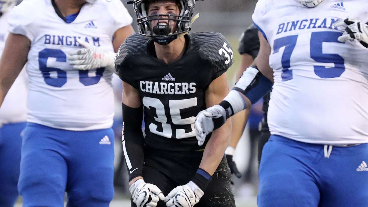 Corner Canyon's Borg Owen celebrates a tackle during a 6A quarterfinal football game against Bingham at Corner Canyon High School in Draper on Friday, Nov. 6, 2020. The three-time defending state champion Chargers are on a 40-game winning streak entering the 2021 season.