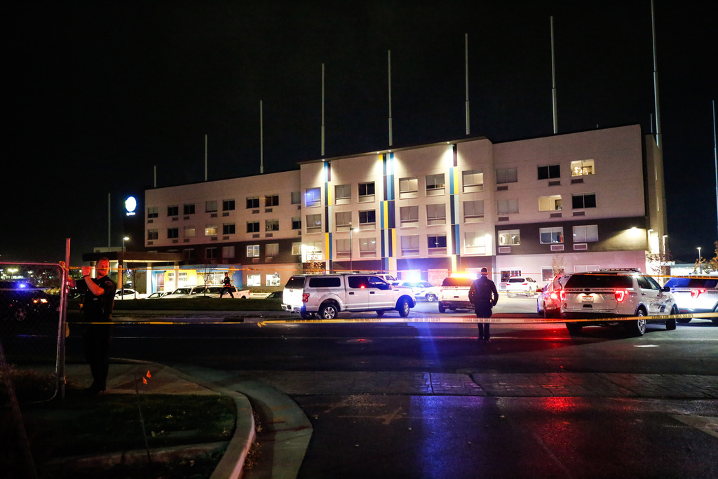 First responders are pictured at the scene of a shooting near a Winco in Midvale on Friday, Nov. 6, 2020.