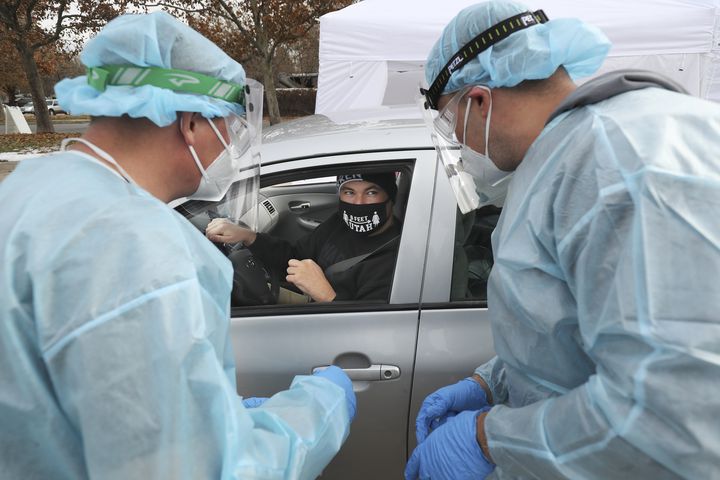 Jon O’Brien gets a COVID-19 test at a Utah National Guard Joint Task Force 97 mobile testing site in Salt Lake City on Tuesday, Nov. 10, 2020. The Guard has approximately 275 service members mapping support for contact tracing, mobile testing, facility assessment and training, and warehouse operations.