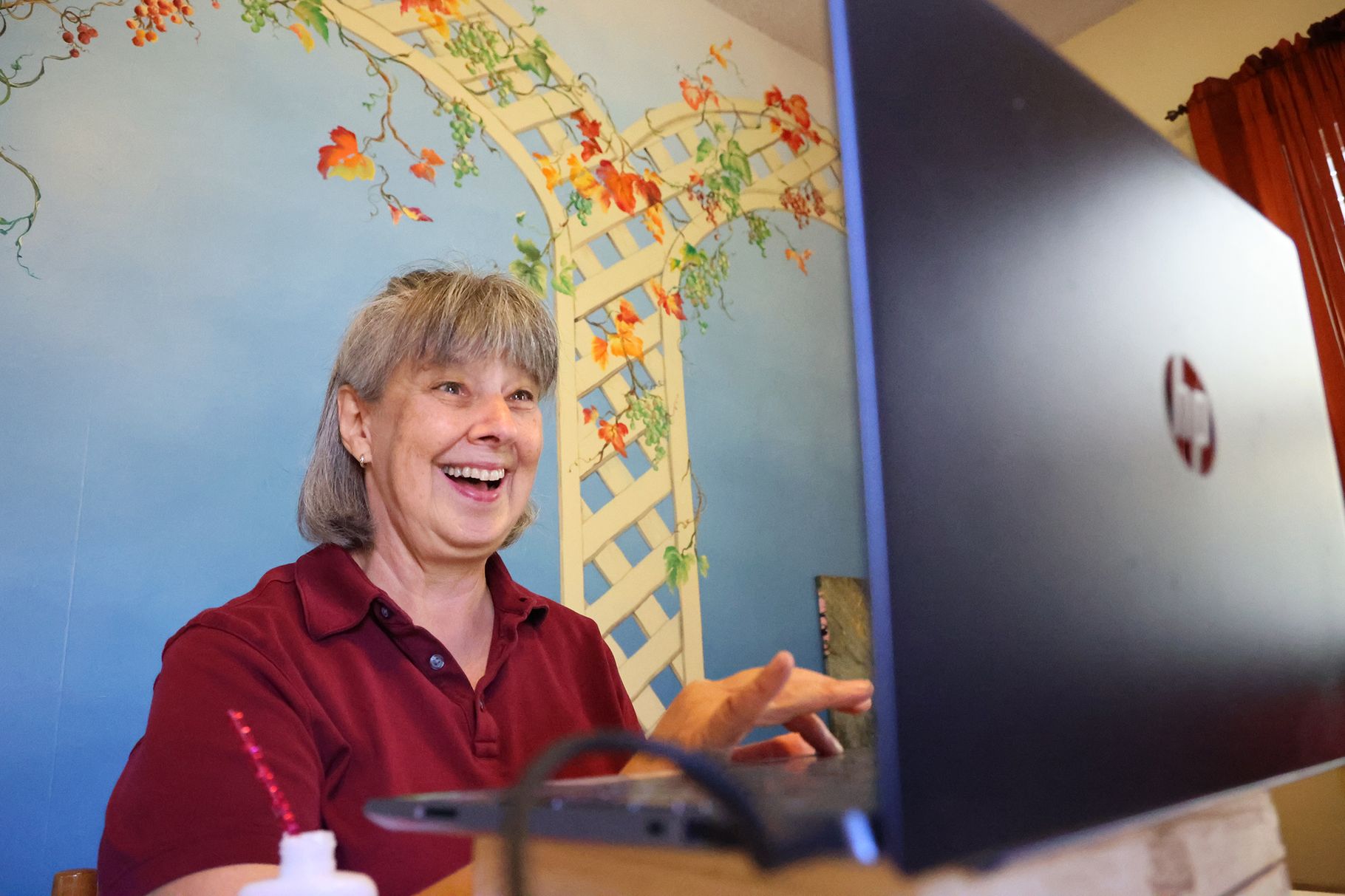 Vickie Venne talks with the instructor and fellow students while participating in an online class through Salt Lake County Aging Services from her Salt Lake City home on Tuesday, Nov. 3, 2020.