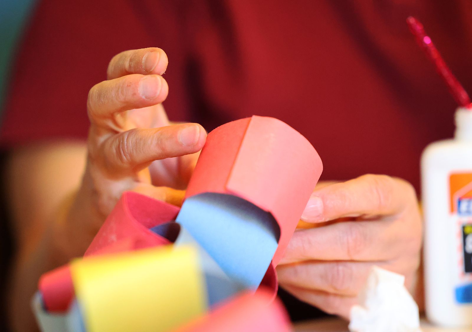 Vickie Venne works on a craft as she participates in an online class through Salt Lake County Aging Services from her Salt Lake City home on Tuesday, Nov. 3, 2020.