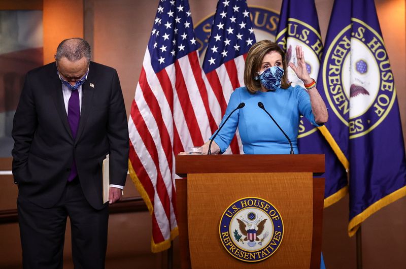 U.S. Speaker of the House of Representatives Nancy Pelosi (D-CA) and Senate Democratic Leader Chuck Schumer (D-NY) speak to reporters about the 2020 U.S. presidential election results and the continuing coronavirus disease (COVID-19) pandemic during a news conference at the U.S. Capitol in Washington, U.S., November 12, 2020. REUTERS/Hannah McKay