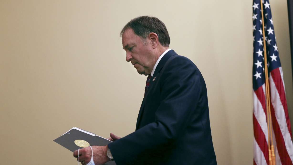 Gov. Gary Herbert leaves a COVID-19 briefing at the Capitol in Salt Lake City on Thursday, Nov. 12, 2020.