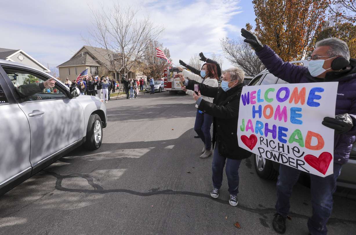 Vietnam veteran Warren Craig Eby waves to Cindy Lampropoulos, Karen Lozano and Richard Lozano from the passenger side window during a welcome home celebration in Saratoga Springs on Friday, Nov. 13, 2020. Eby was hospitalized for seven weeks with COVID-19.