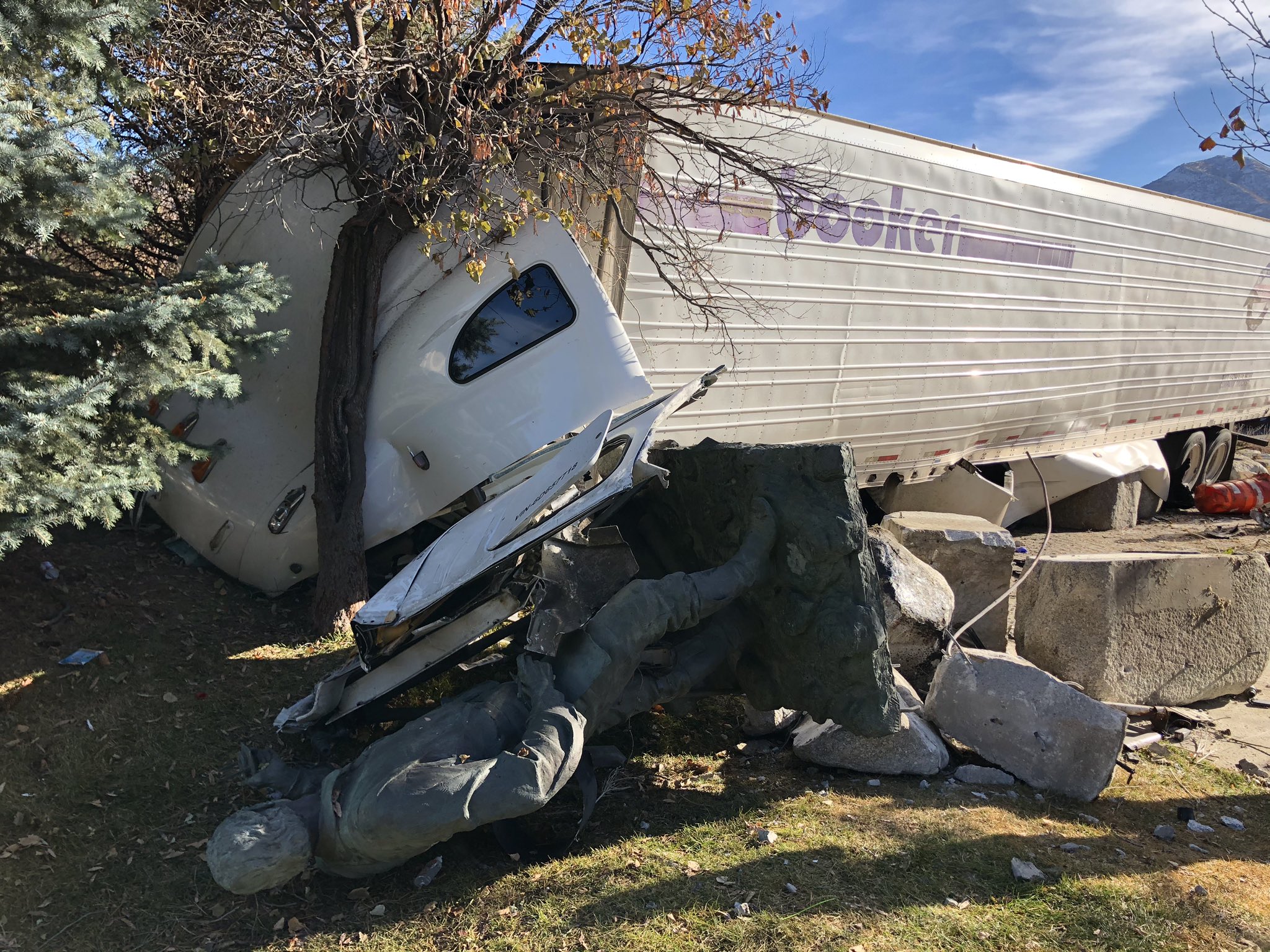 Driver hospitalized after semitruck loses brakes in Parleys Canyon, crashes into monument 