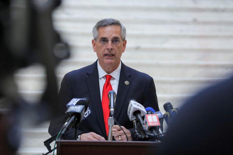 FILE PHOTO: Georgia Secretary of State Brad Raffensperger gives an update on the state of the election and ballot count during a news conference at the State Capitol in Atlanta, Georgia, U.S., November 6, 2020. REUTERS/Dustin Chambers/File Photo
