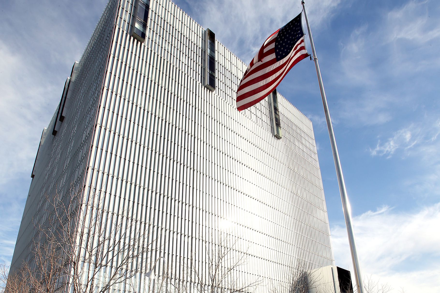 A flag flies in front of the federal courthouse in Salt Lake City on Tuesday, Feb. 18, 2020.  