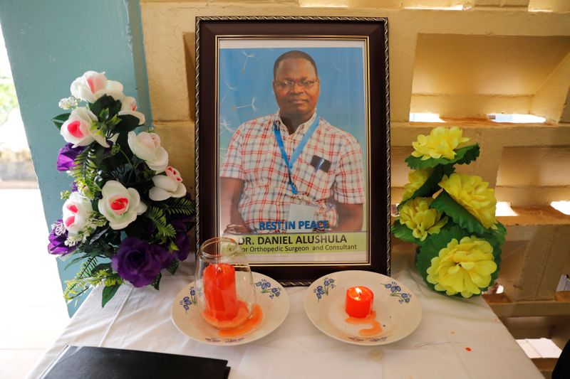 Photo of Kenyan Doctor Daniel Alushula who died of COVID-19 is seen at a memorial station at the Busia referral hospital, Busia county, Kenya November 13, 2020.  REUTERS/Baz Ratner