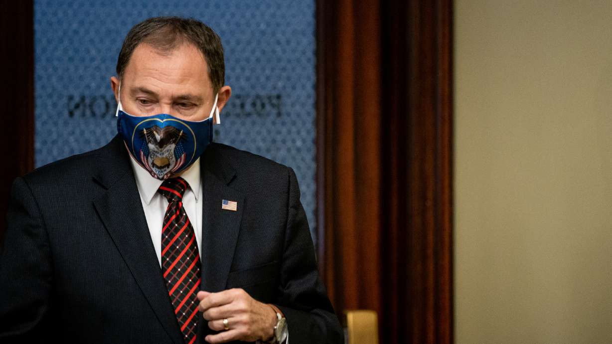 Gov. Gary Herbert arrives for his monthly news conference at the Capitol in Salt Lake City on Thursday, Nov. 19, 2020.
