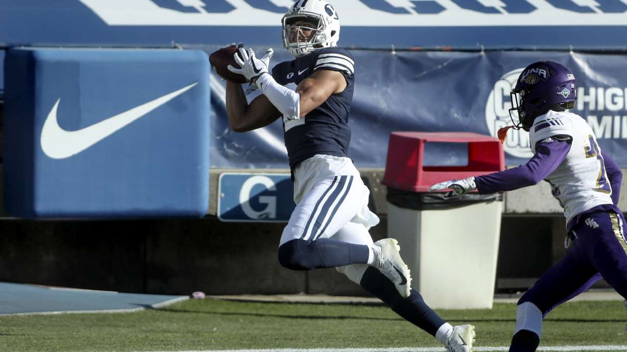 Brigham Young Cougars wide receiver Neil Pau'u (2) hauls in a touchdown over North Alabama Lions defensive back Gerrell Green (28) during a game in Provo on Saturday, Nov. 21, 2020.