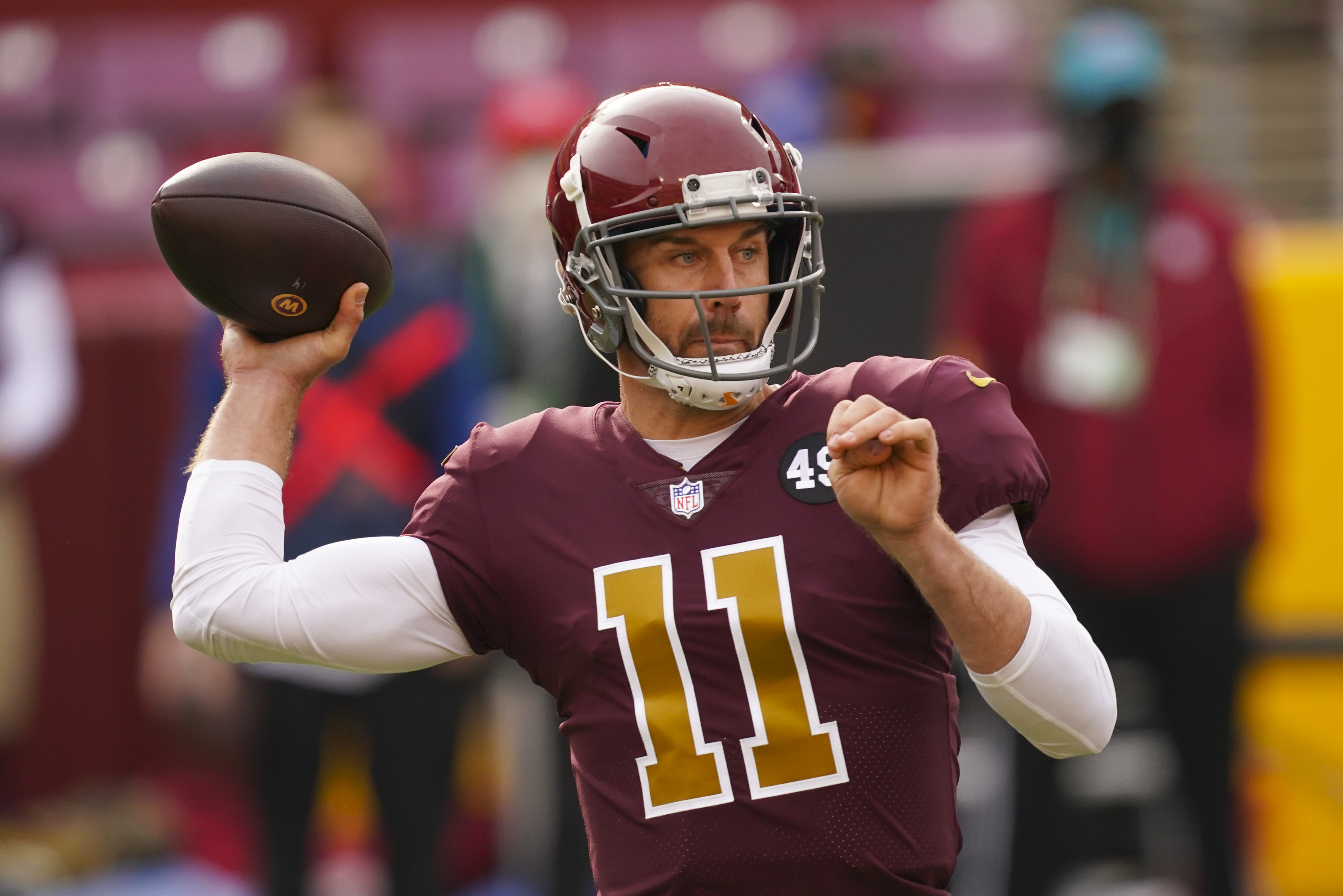 Washington Football Team quarterback Alex Smith (11) passing during the first half of an NFL football game against the Cincinnati Bengals and Washington Football Team, Sunday, Nov. 22, 2020, in Landover.