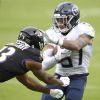 The Latest: USC stops training after positive COVID test