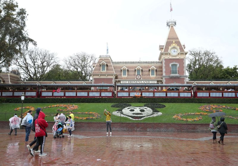 FILE PHOTO: A general view of the entrance of Disneyland theme park in Anaheim, California, U.S., March 13, 2020.  REUTERS/Mario Anzuoni/File Photo
