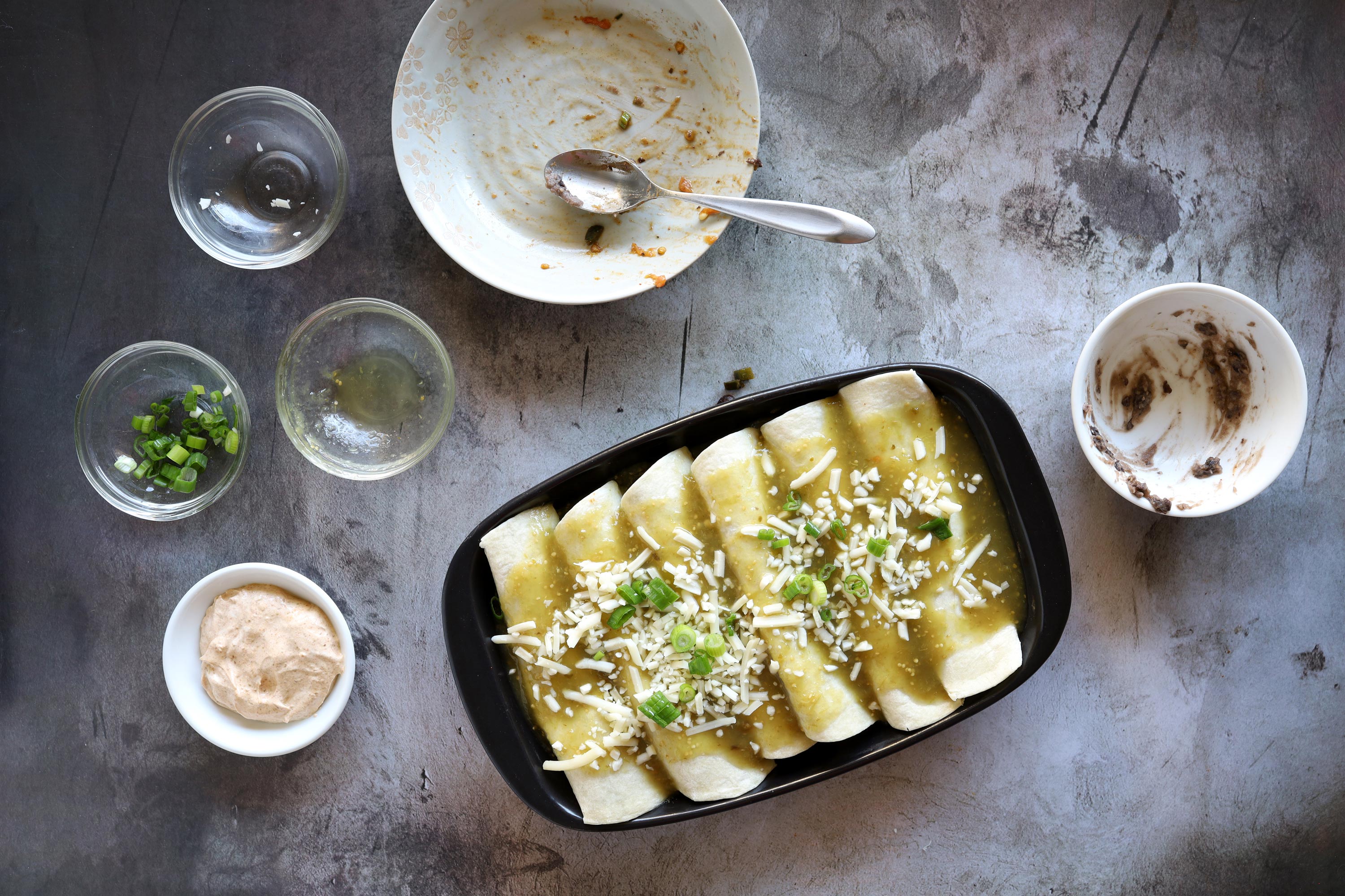 Use leftover Thanksgiving turkey to make turkey black bean enchiladas.