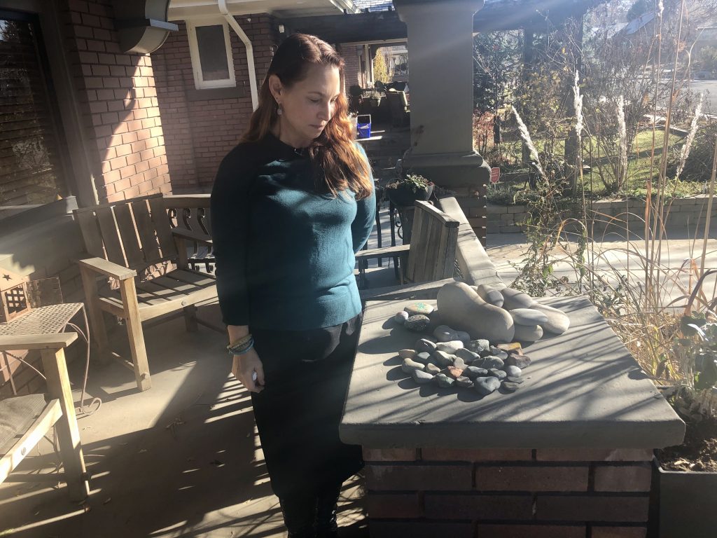 Michelle Nelson collects heart rocks to remind her of her son, Roan, who died by suicide. She says new research is giving her hope.